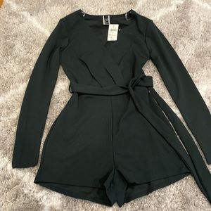 Long sleeve deep green jumpsuit never worn, tags still on!